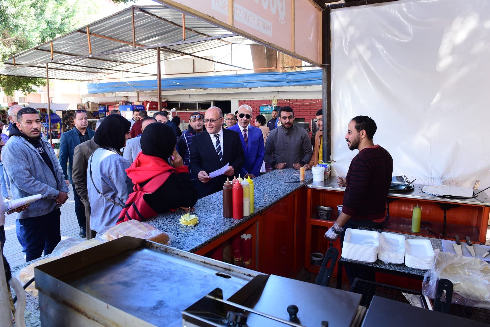 Sohag University President ensures the Quality of the Food provided in the University Cafeteria and meets with Students to determine the Extent of their Satisfaction with the Service Provided.